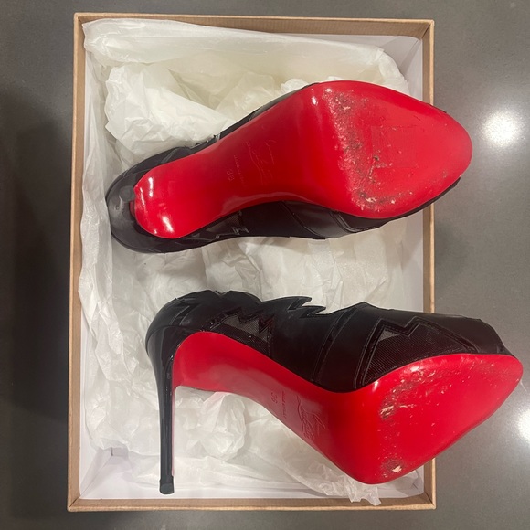 Christian Louboutin’s, worn twice, size 6